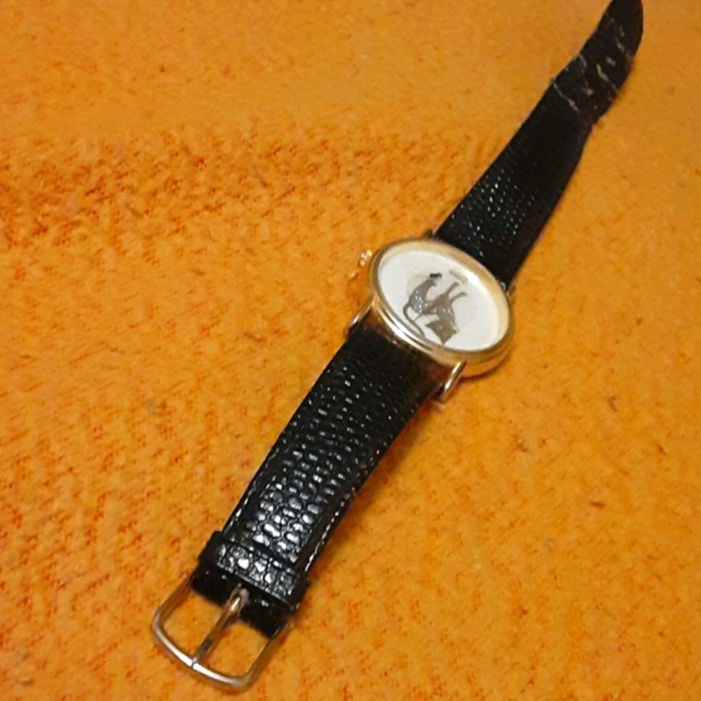Vintage xanadu quartz glitter cat and mouse watch
